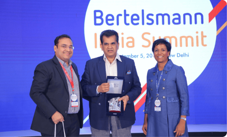 Shobhna Mohn, EVP Growth Regions Strategy and Bertelsmann Investments at Bertelsmann; Pankaj Makkar- Managing Director, Bertelsmann India Investments felicitating Shri Amitabh Kant